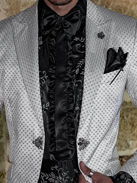 Shirt in black satin with silver-black embroidery and ruffles