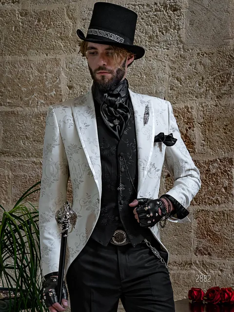 White men's formal jacket with silver floral embroidery and black trousers