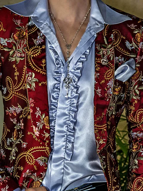 Shirt in light blue satin with frills