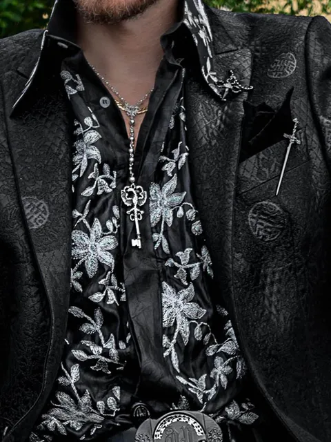Shirt in black satin with pearled embroidery
