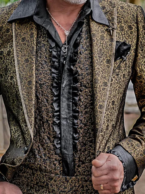Shirt in black crinkle-effect fabric with gold embroidery and frills