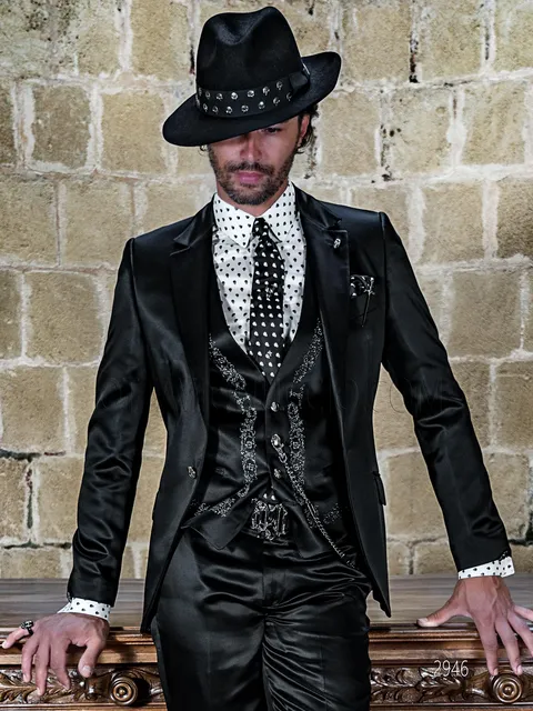 Fashion formal suit in shiny black fabric and waistcoat with silver embroidery