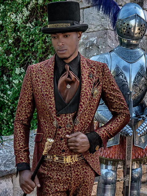 Distinctive gothic-style suit in red and gold damask with rhinestones on the lapel