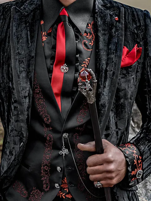 Black satin waistcoat with red embroidered meander