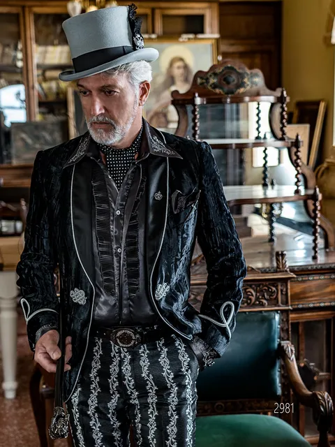 Aristocratic tuxedo in black velvet with silver trimming and brocade trousers