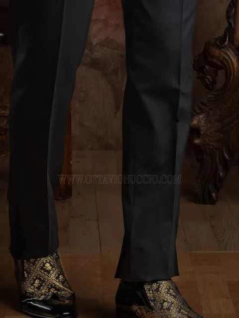 Two-tone black patent shoes with black gold insert