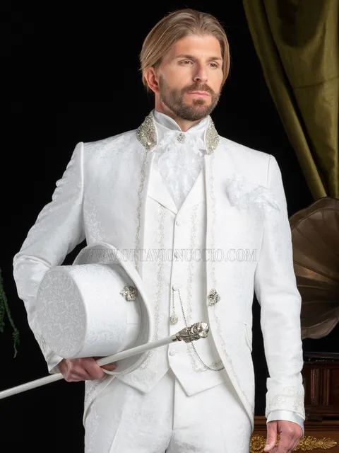 White baroque groom suit with mandarin collar and silver embroidery