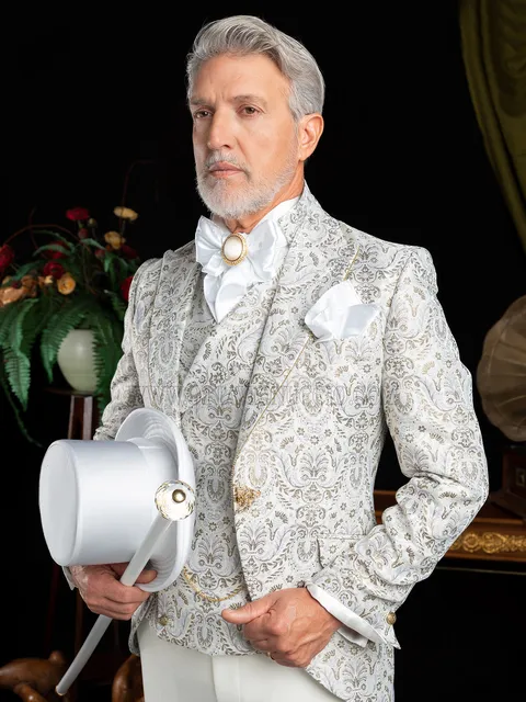 Groom suit in white brocade with white trousers