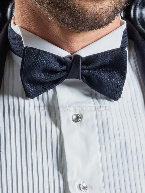 Two-coloured bow-tie in blue micro patterns