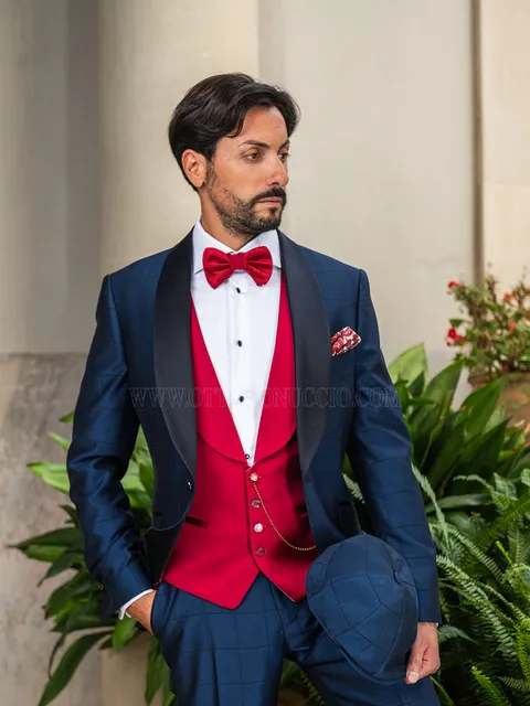 Men's blue checked shawl lapel tuxedo with red waistcoat