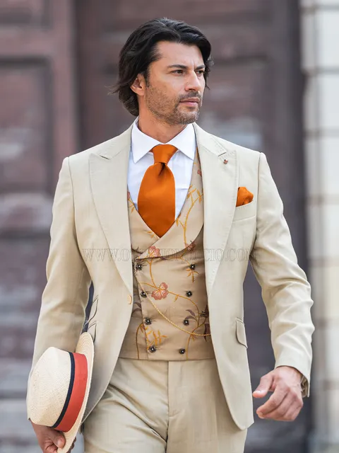 Sand groom suit in boho chic style