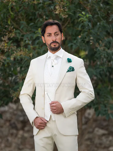Cream groom suit for garden weddings