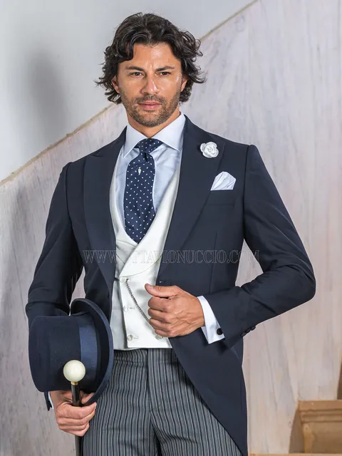 Classic blue morning suit for the groom with striped trousers
