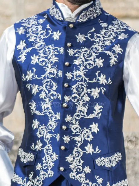 Mandarin collar waistcoat in royal blue fabric with silver embroidery