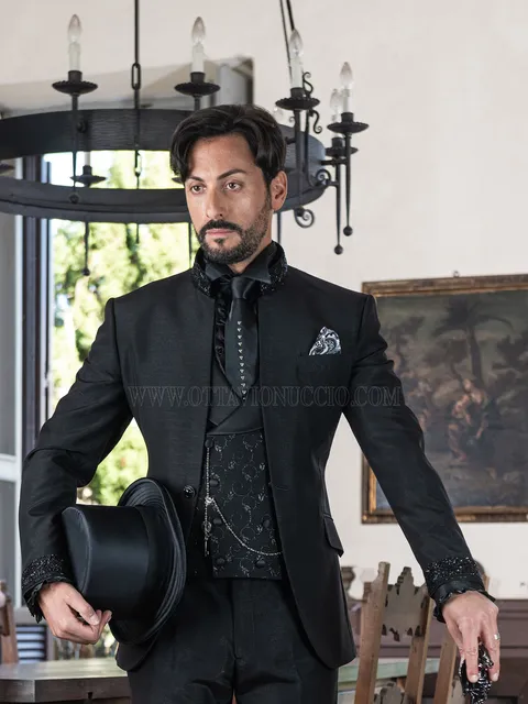 Gothic mandarin collar suit in black with trimming on the collar and cuffs