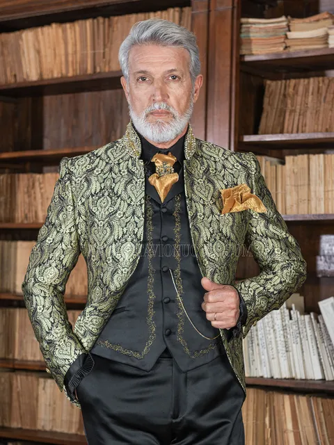 Gothic groom suit in gold brocade with trimming on the mandarin collar
