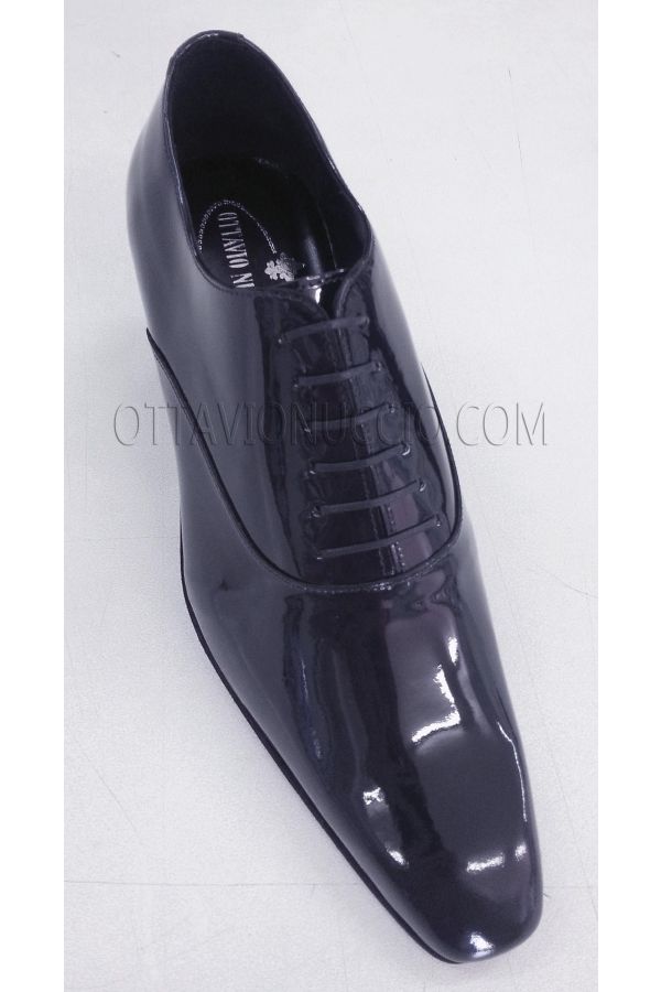 Oxford shoes made from blue patent leather.